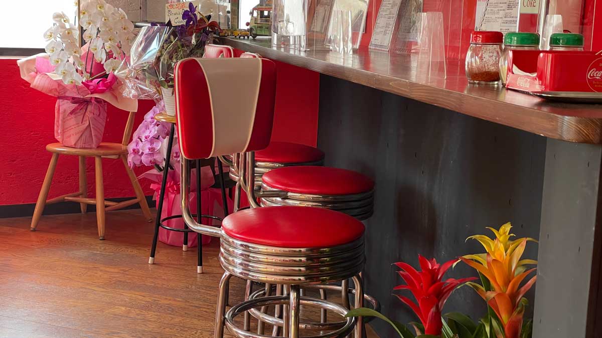 red and white color V shape back bar stools from Bruno’s Pizza diner in Nara Japan